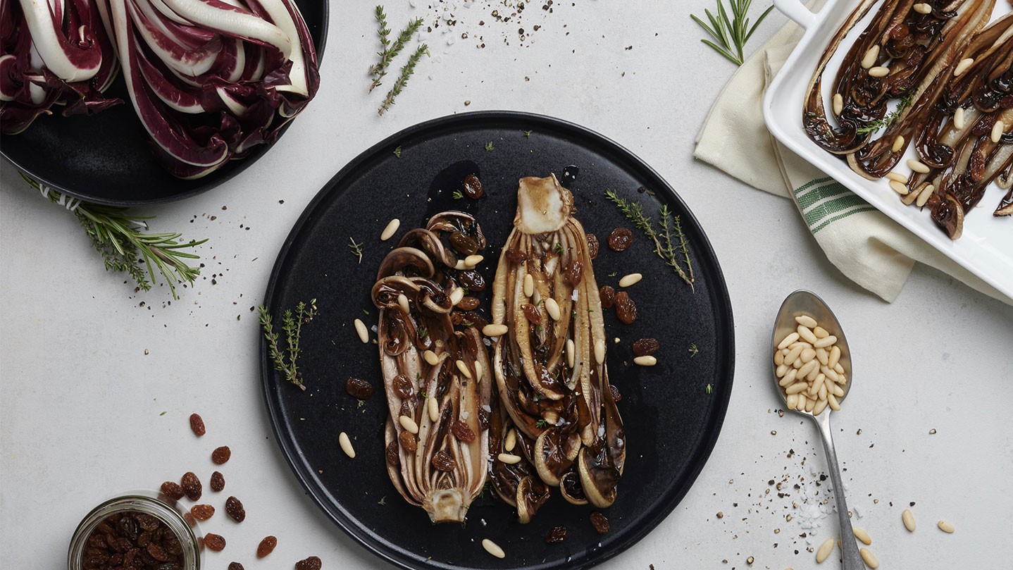 Baked radicchio with pine nuts and raisins